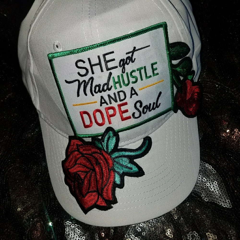 "She got mad hustle and a dope soul" hat